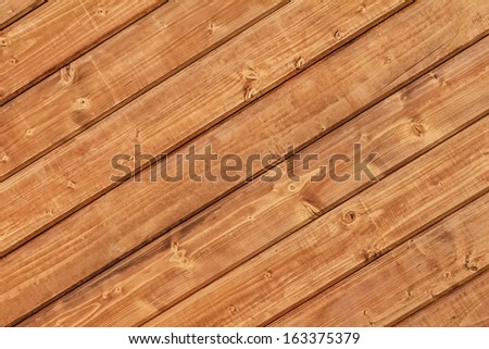 White Pine planks hut wall texture, with wood knots and joint grooves - detail.