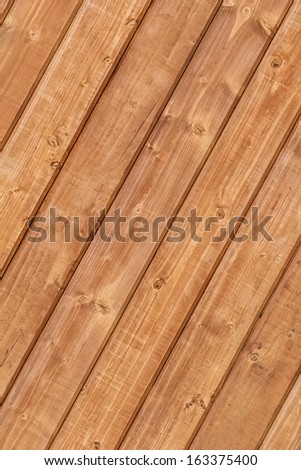 White Pine planks hut wall texture, with wood knots and joint grooves - detail.
