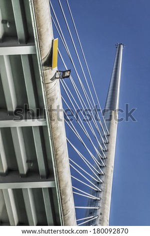 Suspension Ada Bridge, Belgrade, Republic of Serbia, with steel girder framework, prestressed concrete, steel boxes, ribs and beams, and bridge striking sky-high pylon top point detail.