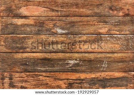 Patio garden table surface texture, weathered and cracked made of knotted White Pine stained and old varnished planks.