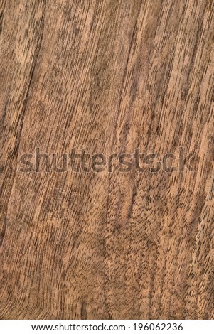 Walnut hardwood texture sample, with featured fine surface grain and annual growth lines.