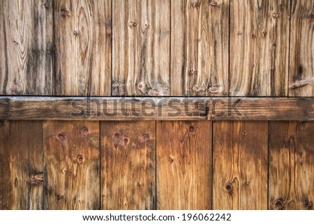 Old Pine wood fence planks, with featured annual growth ring line patterns and knots details, with rusty nails and phillips screw embedded