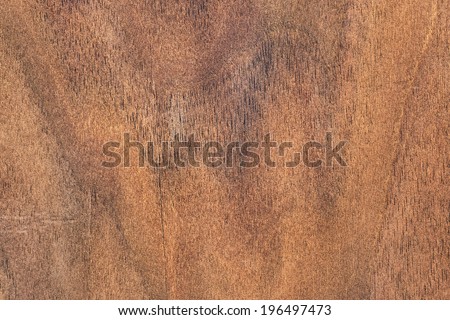 Walnut hardwood texture sample, with featured fine surface grain and annual growth lines