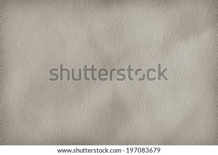 Photograph of primed, coarse grain, artist\'s Cotton duck canvas crumpled vignette texture sample