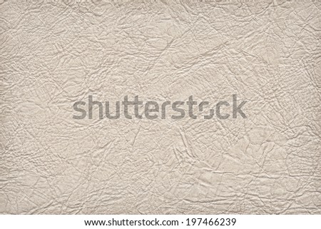 Photograph of coarse, wrinkled artificial leather off-white vignette texture sample
