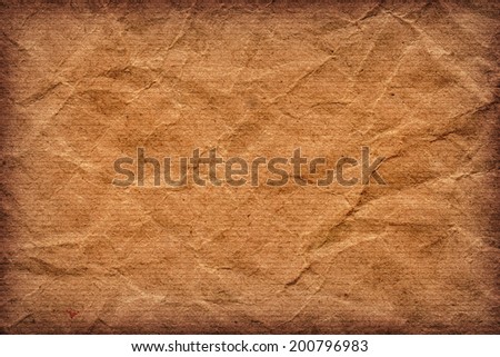 Photograph of old recycle, striped kraft Brown paper, coarse grain, crumpled, vignette, grunge texture