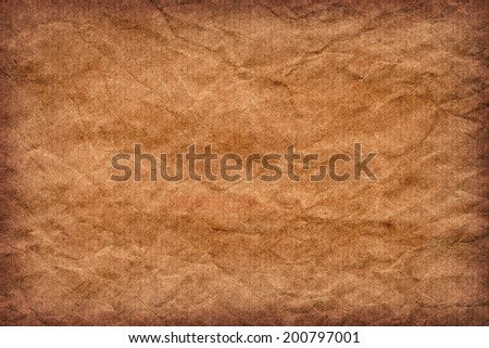 Photograph of old recycle, striped kraft Brown paper, coarse grain, crumpled, vignette, grunge texture