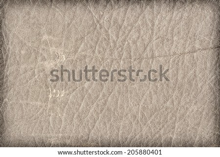 Photograph of old, weathered, rough, creased, coarse grained, exfoliated Beige leather, vignette grunge texture sample