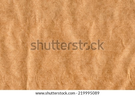 Photograph of Brown Recycle Paper, coarse grain, crumpled grunge texture sample.