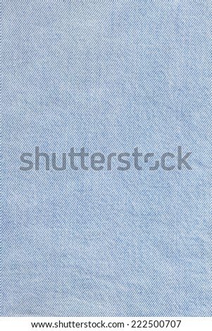 Photograph of Blue Cotton denim fabric grunge texture sample.