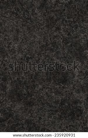 Photograph of Charcoal Black Recycle Kraft Paper, coarse grain, bleached, mottled, spotted, grunge texture sample.