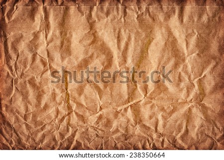 Recycle Brown Kraft Paper Bag, coarse grain, crumpled, vignette, grunge texture detail.