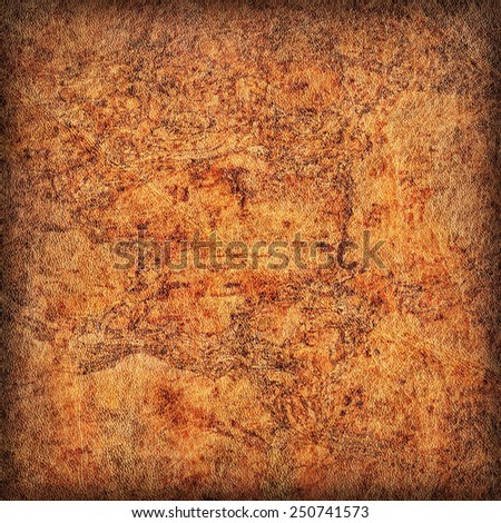 Photograph of old Brown Cowhide, weathered, rough, creased, coarse grained, exfoliated, blotted, mottled, vignette grunge leather texture.