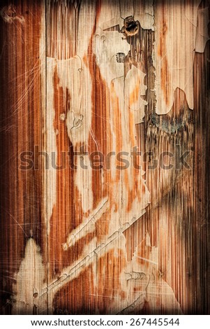 Photograph of obsolete old, weathered, varnished Wooden Laminated Panel, cracked, scratched, vignette grunge texture.