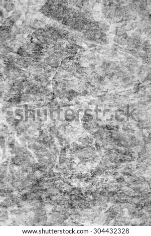 Photograph of old Gray animal skin parchment, creased, coarse grained, grunge texture sample.