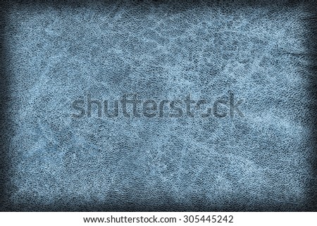 Photograph of Old, Dark Blue Cowhide, Weathered, Coarse, Creased, Exfoliated, Cracked, Vignette Grunge Texture Sample.