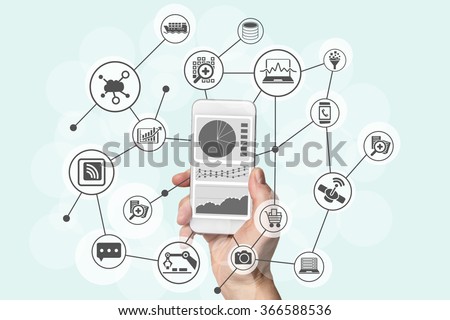 Predictive analytics and big data concept with hand holding modern smart phone to analyze data from marketing, shopping, cloud computing and mobile devices