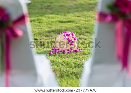 A decorative flower ball on the ground