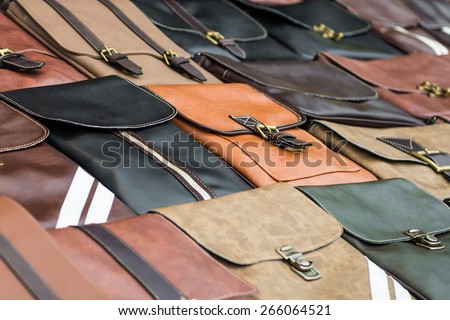 Big pile of leather bags