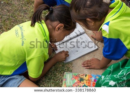 MAE SOT, THAILAND - NOVEMBER11, 2015 : Unidentified children of migrant workers are intending study at non-formal learning place near plant the parents their work at MAE SOT, THAILAND.