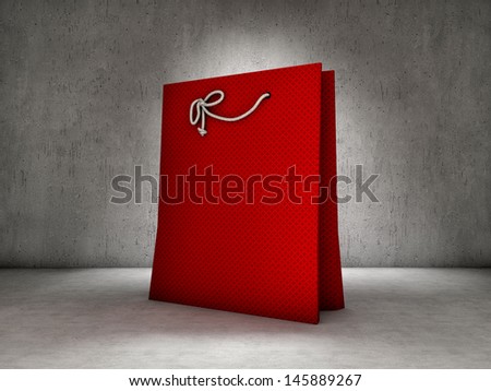 Red shopping bag on concrete background