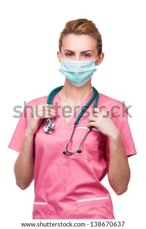 portret of young medic with medical mouth protection and stethoscop