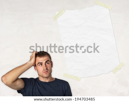 smart thinking man and white blank paper and light background