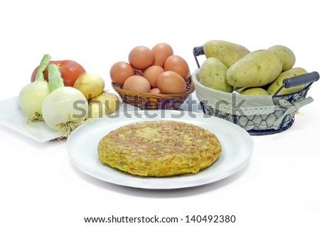 Spanish Tortilla Still life, with onions, eggs, tomato and potatoes
