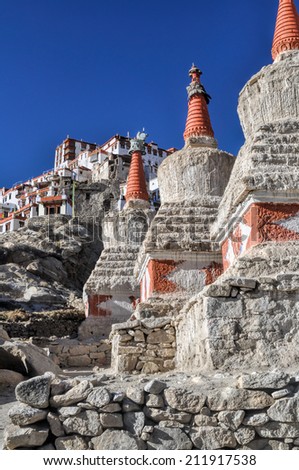A row of stone monuments at the feet of Chemrey monastery in Ladakh