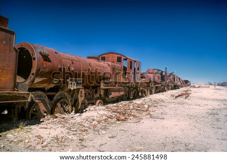 Old locomotive graveyard in desert near Salar de Uyuni in Bolivia