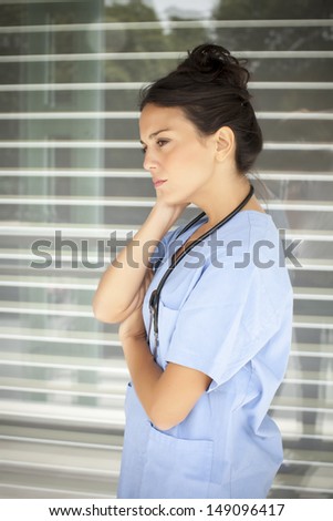 nice health care worker with uniform and stethoscope