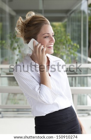 blonde and young lady on phone and smiling
