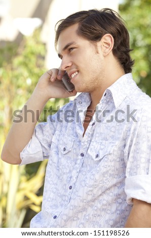 man talking by cellular phone