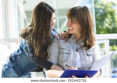 Mother and daughter Reading and writing after school