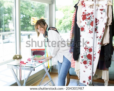 Young woman designing clothes