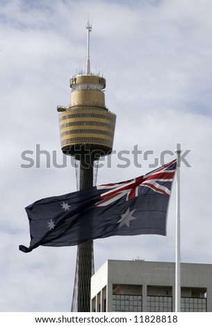 australian flag in front of sydney tower