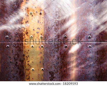 Rusted industrial riveted metal
