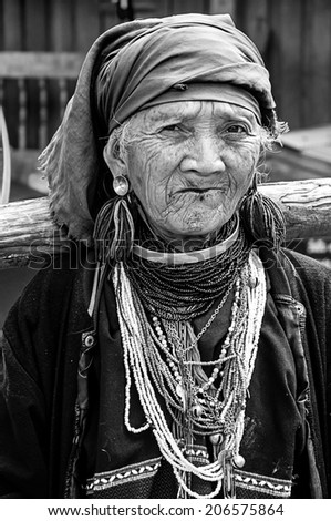 CHIANG MAI,THAILAND - OCTOBER 4 ; Portrait of an old Karen tribe woman, Thai ethnicity, poses for camera at Baan Sa Ngin, Omkoi on October 4,2009 in Chiang mai,Thailand.