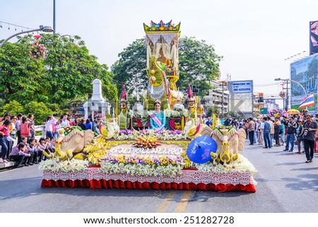 CHIANG MAI,THAILAND-FEBRUARY 07 :Unidentified peoples are in parade with fresh flowers decorate car in annual 39th Chiang Mai Flower Festival,  on February 07, 2015 in Chiang Mai,Thailand.
