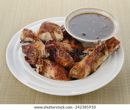 Thai grilled chicken on mat
