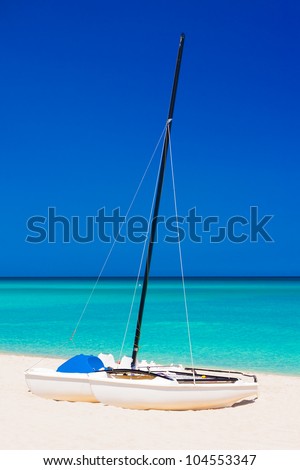 Sailing boats on the  beach of Varadero in Cuba (vertical format without people)