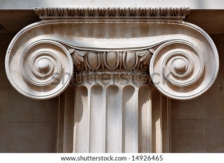 Ionic column capital with scrolling volutes