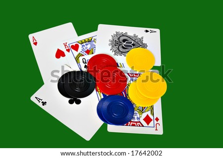 Cards and token isolated on green with clipping path