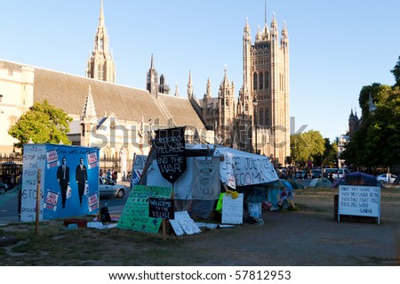 LONDON -JULY 18: Peace campaigners in Parliament Square July 18, 2010 in London. Campaigners have set up a campsite in front of the Houses of Parliament to protest against the UK involvement in war