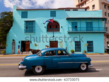 stock photo HAVANA OCTOBER 23 Old car in front of a building with