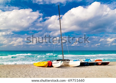 Recreational renting boats landed on the shore of the beautiful cuban beach of Varadero