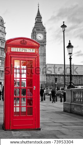 A traditional red phone booth in London with the Big Ben in a black and white background A traditional red phone booth in London with the Big Ben in a black and white background
