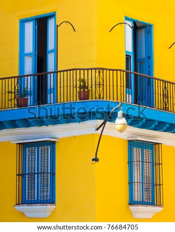 Detail of a restored colonial building in Old Havana with typical caribbean doors and balconies