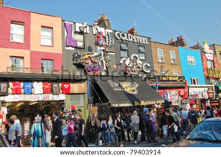 LONDON-MAY 29:Shoppers in  the Camden Market May 29,2011 in London.The Market is the fourth most popular attraction in the British capital attracting approximately 100,000 people each weekend