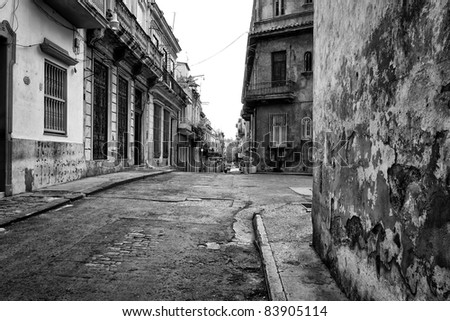 Gritty black and white image of an old street in Havana